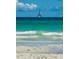 Sailboat on calm ocean waters, stunning view from property at 105 162Nd Ave, Redington Beach, FL 33708