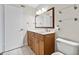 Clean bathroom with wood vanity and a toilet at 2671 Sabal Springs Cir # 102, Clearwater, FL 33761