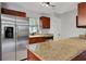 Modern kitchen with stainless steel appliances and granite countertops at 3110 Camphor Dr, Plant City, FL 33566