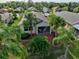 Aerial view of the house with surrounding landscape at 1923 Sterling Glen Ct, Sun City Center, FL 33573