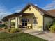 Community library building with entrance and book drop at 1923 Sterling Glen Ct, Sun City Center, FL 33573