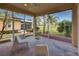 Relaxing screened porch overlooking a lush golf course at 1923 Sterling Glen Ct, Sun City Center, FL 33573