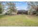 Large backyard with grassy area and privacy at 19230 Climbing Aster Dr, Tampa, FL 33647