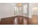 Bright dining room with hardwood floors and large windows at 19230 Climbing Aster Dr, Tampa, FL 33647