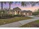 Two-story home with three-car garage at 19230 Climbing Aster Dr, Tampa, FL 33647