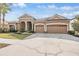 Two-story home with three-car garage at 19230 Climbing Aster Dr, Tampa, FL 33647