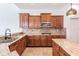 Kitchen with granite countertops and stainless steel appliances at 19230 Climbing Aster Dr, Tampa, FL 33647