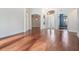 Open living room with hardwood floors and high ceilings at 19230 Climbing Aster Dr, Tampa, FL 33647