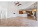 Open living area with view into kitchen at 19230 Climbing Aster Dr, Tampa, FL 33647