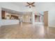 Large living room with high ceilings and tile flooring at 19230 Climbing Aster Dr, Tampa, FL 33647