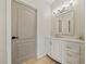 Elegant bathroom with marble vanity and modern fixtures at 3405 Loggerhead Way, Wesley Chapel, FL 33544