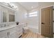 Bathroom with white vanity and subway tile at 3405 Loggerhead Way, Wesley Chapel, FL 33544