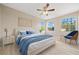 Serene bedroom with a comfy bed and light wood flooring at 3405 Loggerhead Way, Wesley Chapel, FL 33544