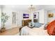 Bright bedroom with ensuite bath and large mirror at 4931 61St S Ave, St Petersburg, FL 33715