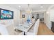 Formal dining room with marble table, chandelier, and hardwood floors at 4931 61St S Ave, St Petersburg, FL 33715