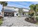 Gray paved driveway leading to a two-car garage at 4931 61St S Ave, St Petersburg, FL 33715