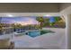 Tranquil pool and spa area with water views at sunset at 4931 61St S Ave, St Petersburg, FL 33715