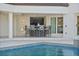 Inviting pool area with a bar and seating at 4931 61St S Ave, St Petersburg, FL 33715