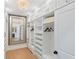 Large walk-in closet with ample shelving and hanging space at 4931 61St S Ave, St Petersburg, FL 33715