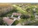 Aerial view of home and surrounding golf course at 5935 Precious View Ct, New Port Richey, FL 34655