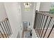 Two-story entryway with an open staircase and natural light at 1712 W Arch St, Tampa, FL 33607