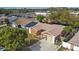 Overhead view of the home, revealing its roofline, landscaping, and neighborhood setting at 5705 103Rd N Ter, Pinellas Park, FL 33782