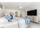 Spacious bedroom with white walls and coastal decor at 1390 Gulf Blvd # 1204, Clearwater, FL 33767