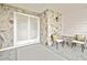 Cozy front porch area with decorative chairs and stonework at 7231 Big Bend Dr, Spring Hill, FL 34606