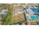 Aerial view showing house, pool, and large backyard at 9696 Groveland St, Seminole, FL 33772