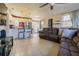 Open kitchen with granite countertop and stainless steel appliances at 9696 Groveland St, Seminole, FL 33772
