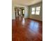 Inviting living area with hardwood floors, ideal for relaxation and entertaining at 1000 Country Club N Rd, St Petersburg, FL 33710
