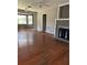 Spacious living room featuring a fireplace and abundant natural light at 1000 Country Club N Rd, St Petersburg, FL 33710