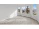 Corner bedroom with plenty of natural light from three large windows at 17925 Nadine Pl, Nokomis, FL 34275