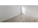 An empty bedroom showing neutral walls, flooring and a window at 17925 Nadine Pl, Nokomis, FL 34275