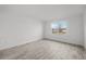 Bedroom with a large window, offering plenty of natural light at 17925 Nadine Pl, Nokomis, FL 34275
