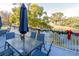 Enjoy water views from this deck featuring a table and chairs at 3207 Green Dolphin St, Tarpon Springs, FL 34689