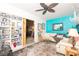 Spacious living area showcasing a comfortable sofa and built-in shelving at 3207 Green Dolphin St, Tarpon Springs, FL 34689