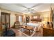King-size bedroom with wood floors and ceiling fan at 5105 N 45Th St, Tampa, FL 33610