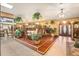 Elegant dining room with hardwood floors, a chandelier, and built-in hutch at 5105 N 45Th St, Tampa, FL 33610