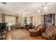 Gathering room with wicker furniture and wood flooring at 5105 N 45Th St, Tampa, FL 33610