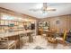 Eat-in kitchen with granite countertops and breakfast bar at 5105 N 45Th St, Tampa, FL 33610