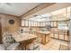 Large kitchen with granite island and stainless steel appliances at 5105 N 45Th St, Tampa, FL 33610