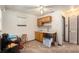 Small kitchenette with wood cabinets and flooring at 5105 N 45Th St, Tampa, FL 33610