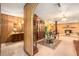 Living area showcasing a wood-paneled archway and built-in hutch at 5105 N 45Th St, Tampa, FL 33610