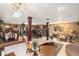 Spacious living room features high ceilings, a fireplace, and elegant furnishings at 5105 N 45Th St, Tampa, FL 33610