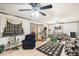 Living room with black and gold themed furniture and checkered rug at 5105 N 45Th St, Tampa, FL 33610