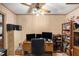 Home office with a large desk and built-in bookcases at 5105 N 45Th St, Tampa, FL 33610