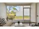 Screened porch with seating and backyard view at 2345 Lake Woodberry Cir, Brandon, FL 33510