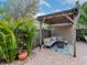 Relaxing backyard patio with pergola, seating area, and lush landscaping at 3512 W Granada St, Tampa, FL 33629
