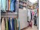 Large walk-in closet with ample shelving and hanging space at 3512 W Granada St, Tampa, FL 33629